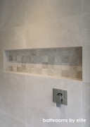 Cashmere Oyster with Mosaix Cloud Stone Squares.
Bathroom & Photo: Bathrooms By Elite